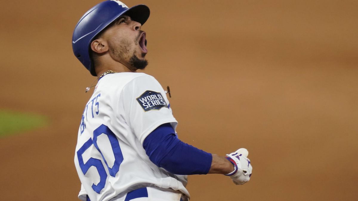 Los Angeles Dodgers' Mookie Betts celebrates after a home run against the Tampa Bay Rays during...
